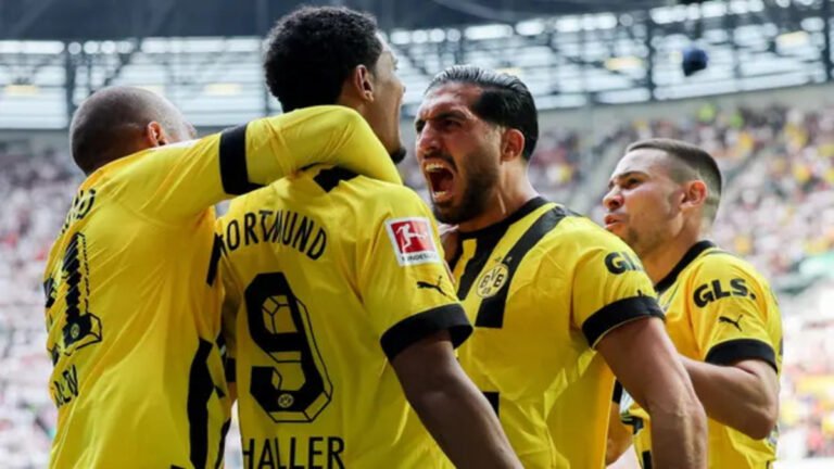 "From Cancer Survivor to Football Hero: Sébastien Haller Leads Dortmund's Charge to Bundesliga Glory! 🌟⚽