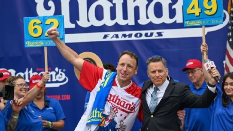 "Jaws Reigns Supreme in Rain or Shine: Joey Chestnut's Historic Hot Dog Victory!"