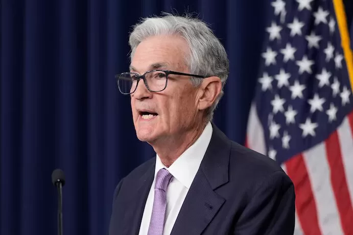 "Fed Slashes Interest Rates Amid Inflation Woes – First Cut Since 2020!"