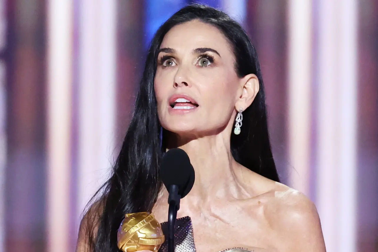 "Golden Globes 2025: Demi Moore's Emotional Win Steals the Spotlight as Emilia Pérez Dominates Early Awards!"